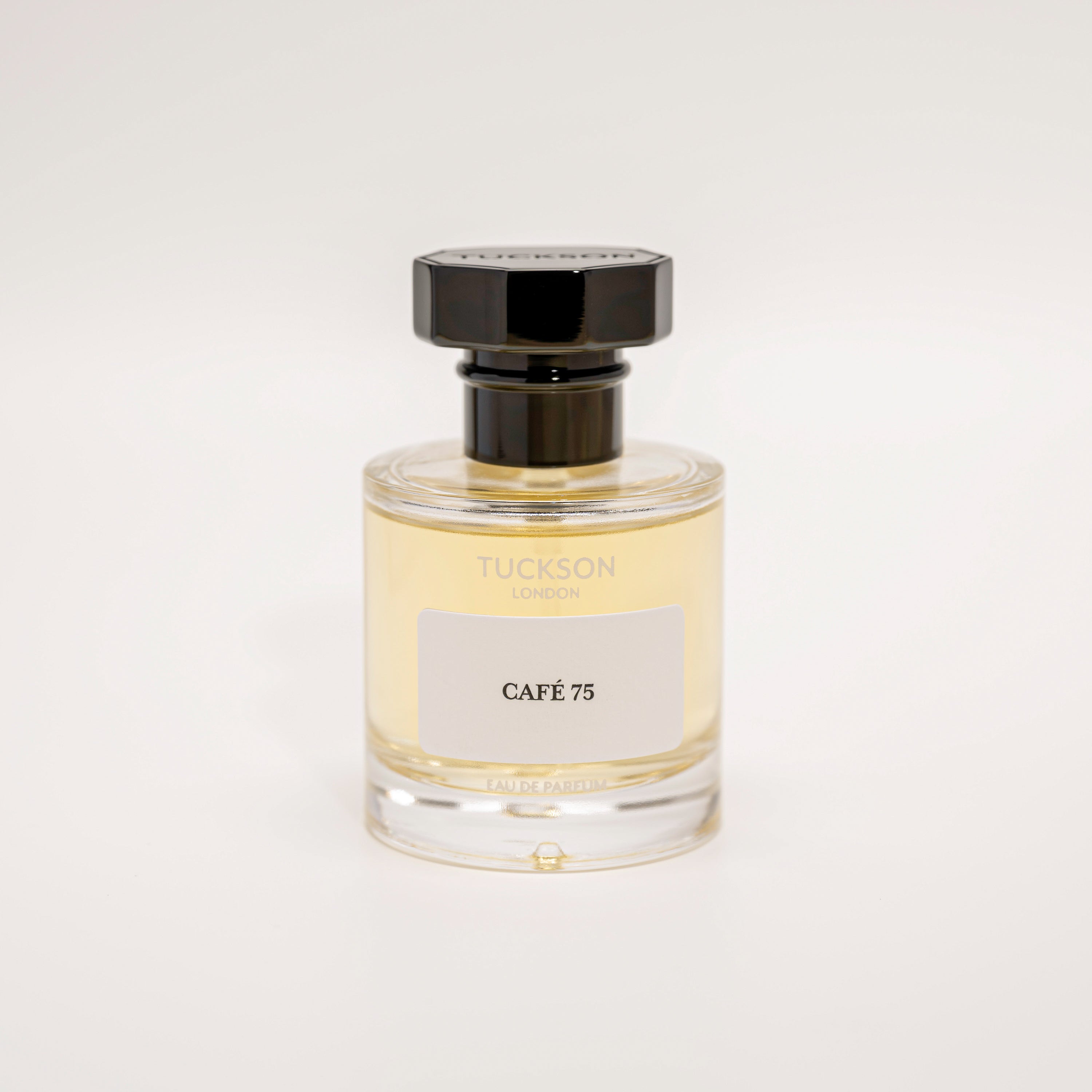 TUCKSON Cafe 75 Eau de parfum 50ml atomiser front, with black metal Tuckson overcap 