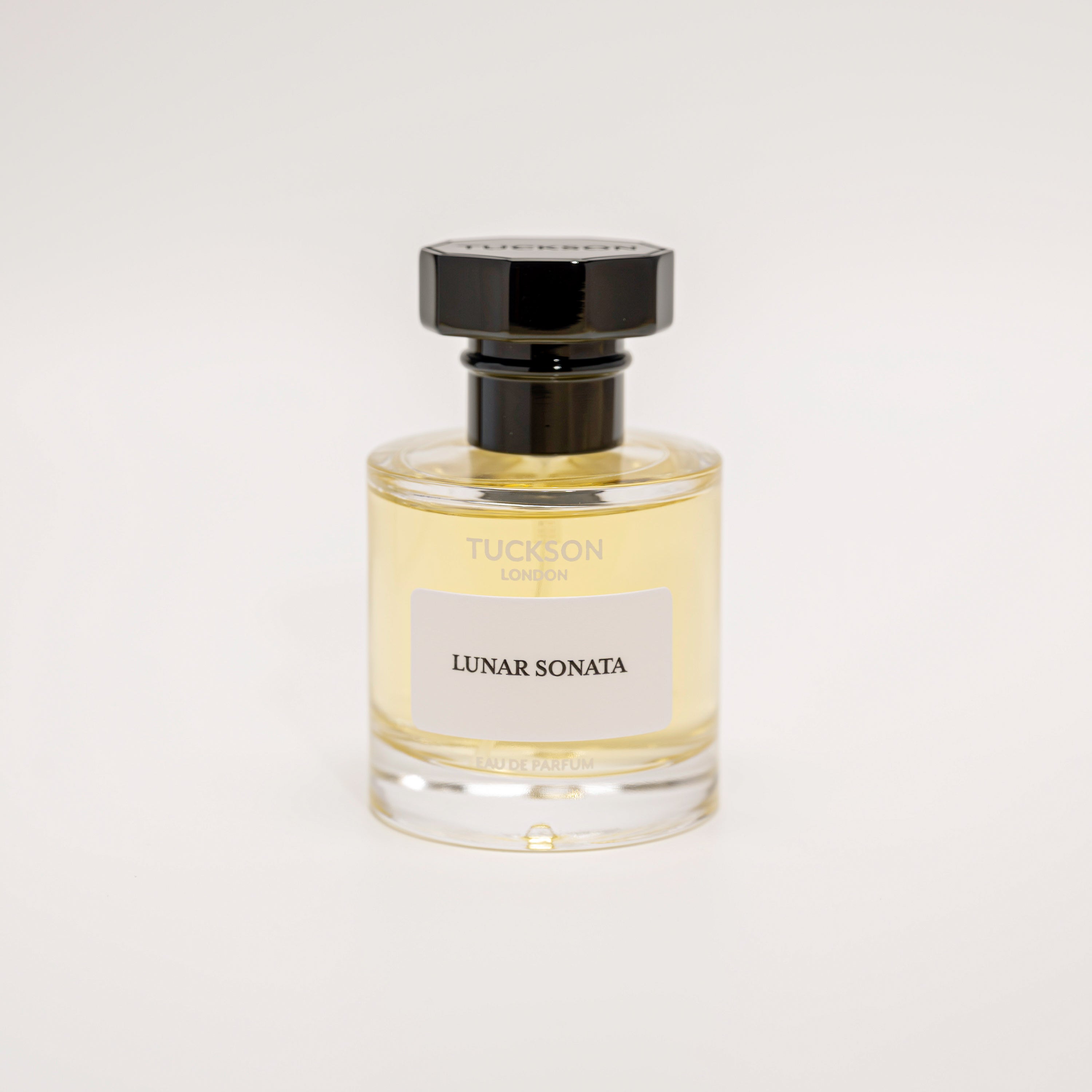 TUCKSON Lunar Sonata Eau de parfum 50ml atomiser front, with black metal Tuckson overcap 
