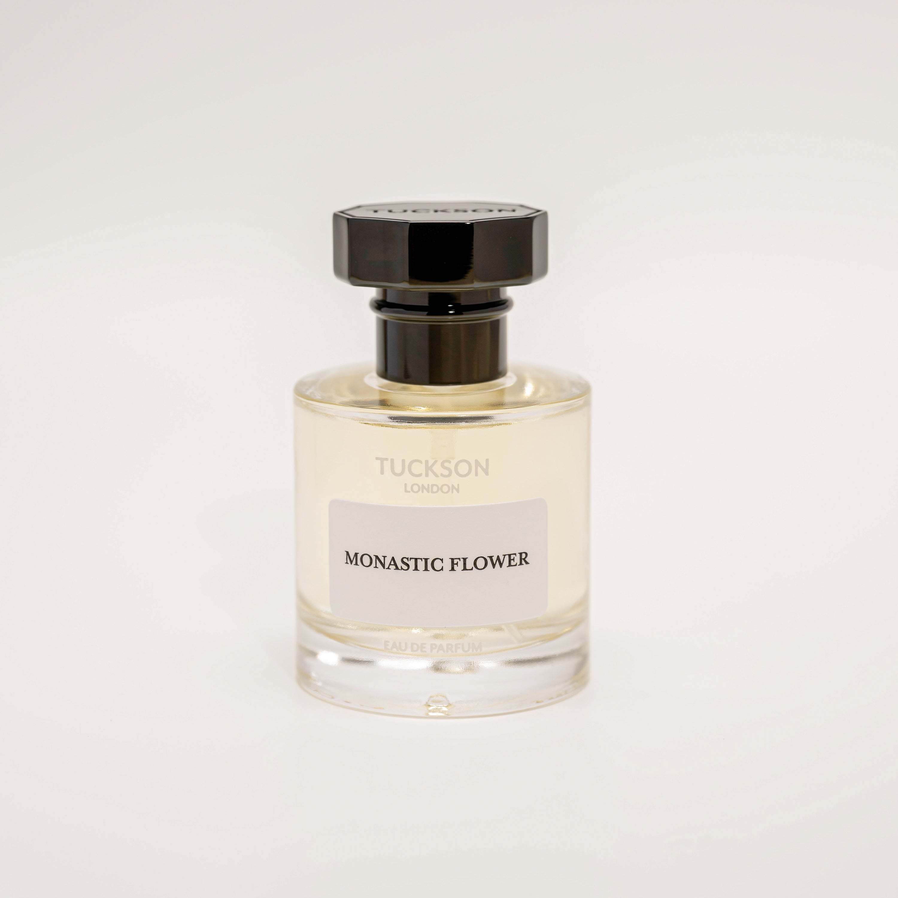 TUCKSON Monastic Flower Eau de parfum 50ml atomiser front, with black metal Tuckson overcap 