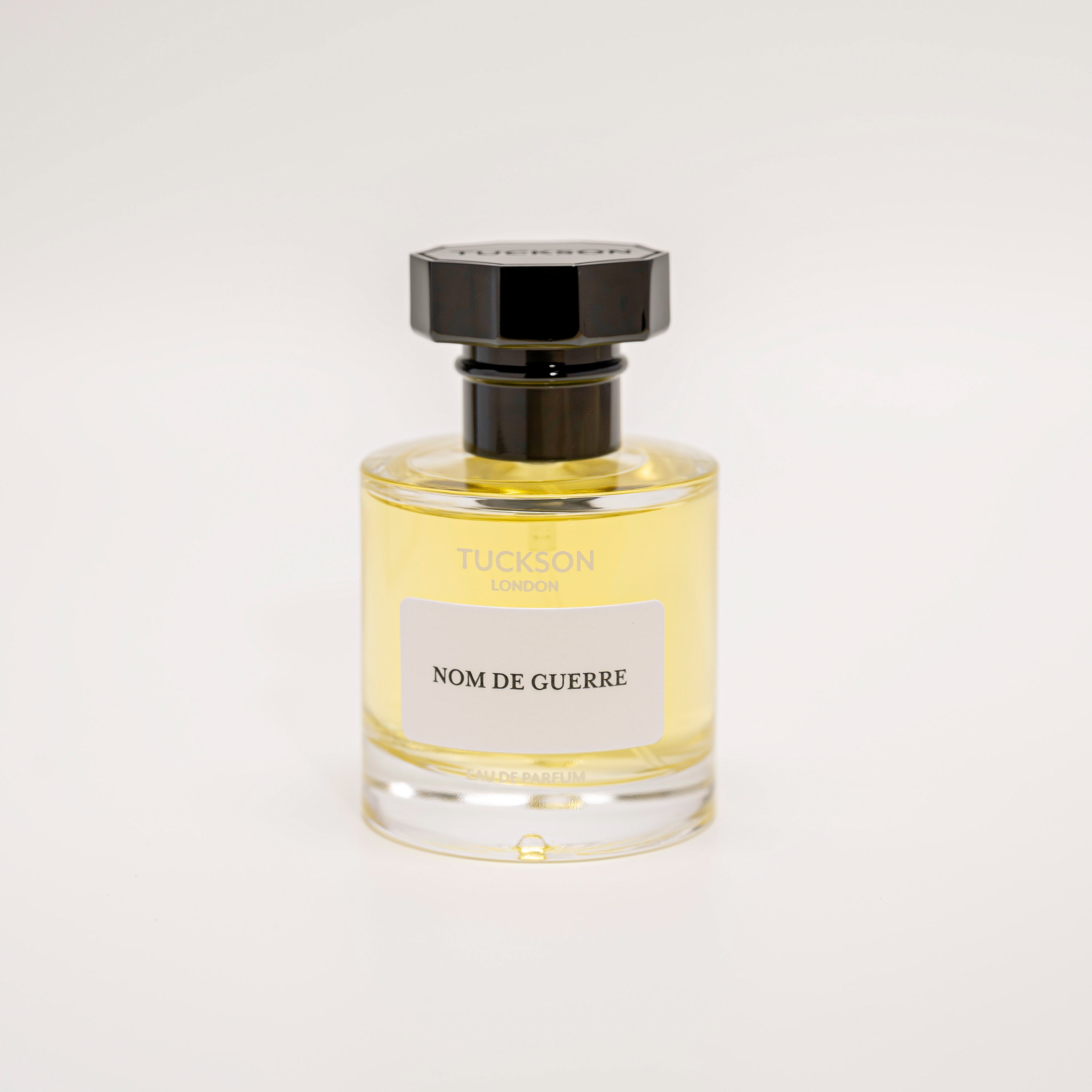 TUCKSON Nom De Guerre Eau de parfum 50ml atomiser front, with black metal Tuckson overcap 