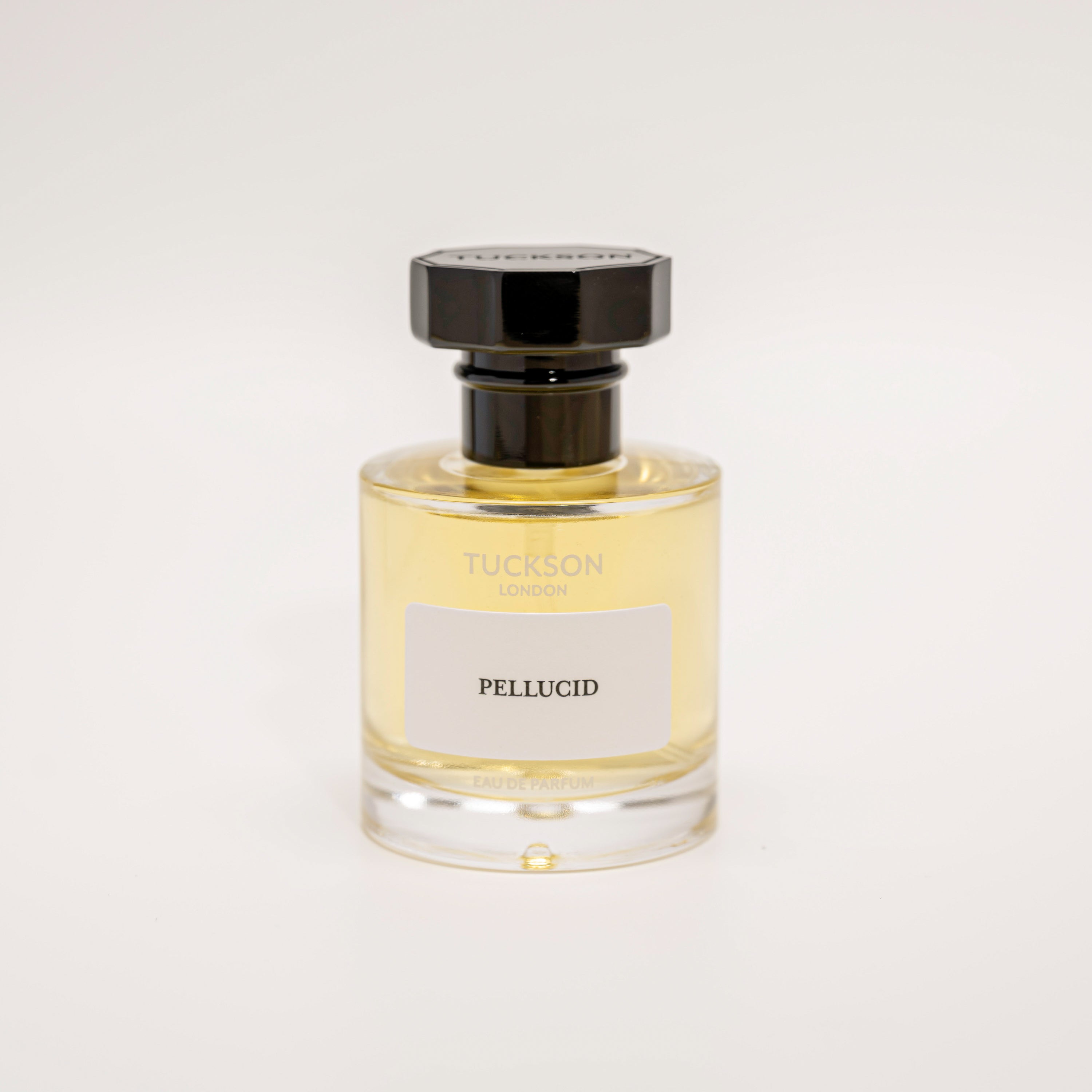 TUCKSON Pellucid Eau de parfum 50ml atomiser front, with black metal Tuckson overcap 