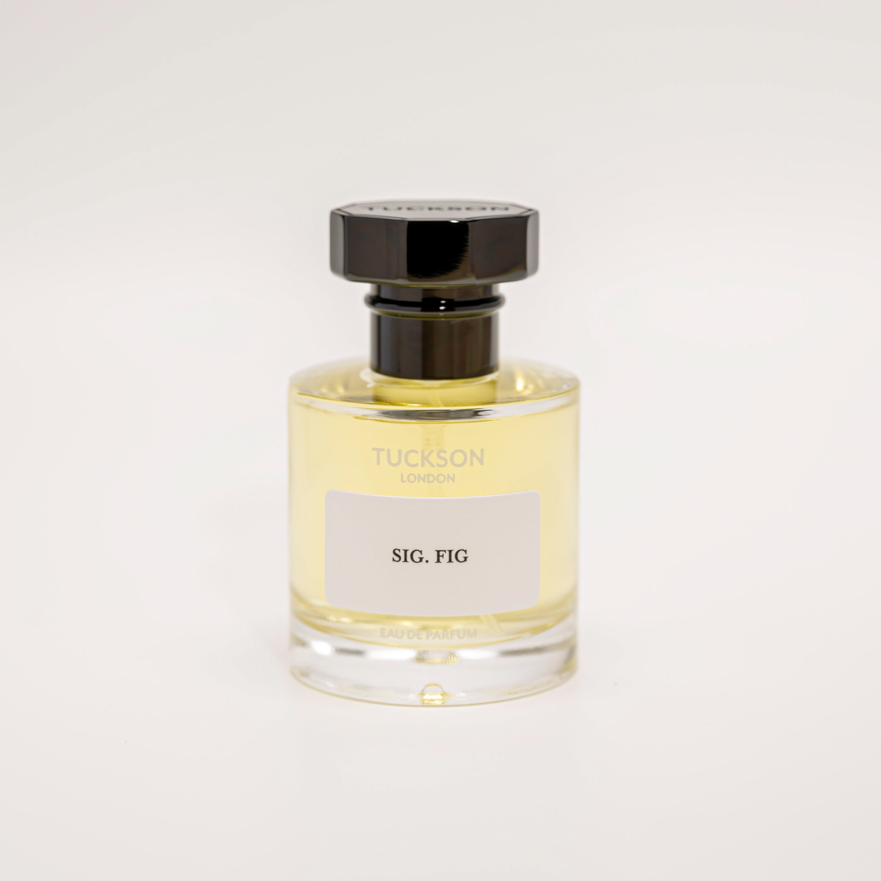TUCKSON Sig Fig Eau de parfum 50ml atomiser front, with black metal Tuckson overcap 