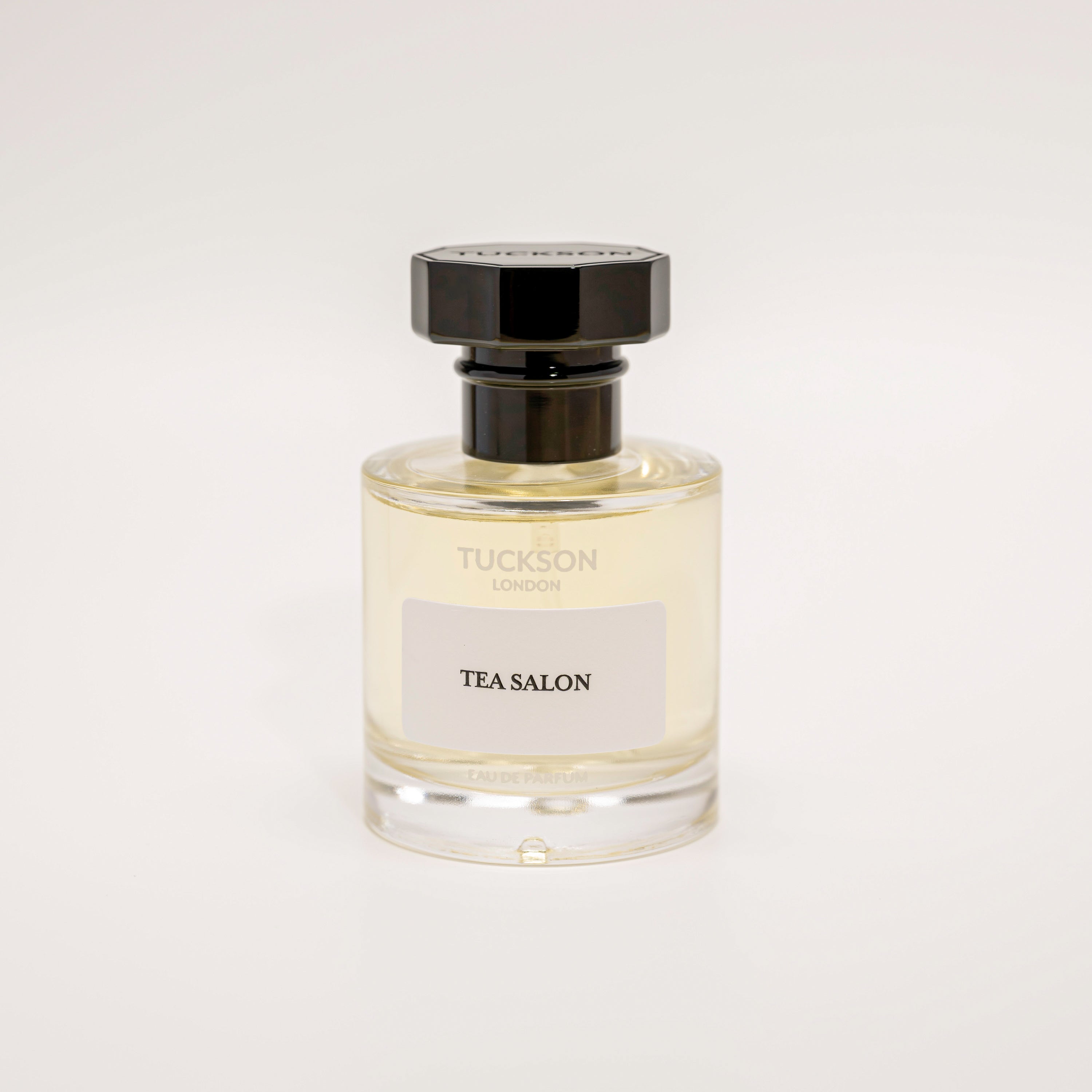 TUCKSON Tea Salon Eau de parfum 50ml atomiser front, with black metal Tuckson overcap 