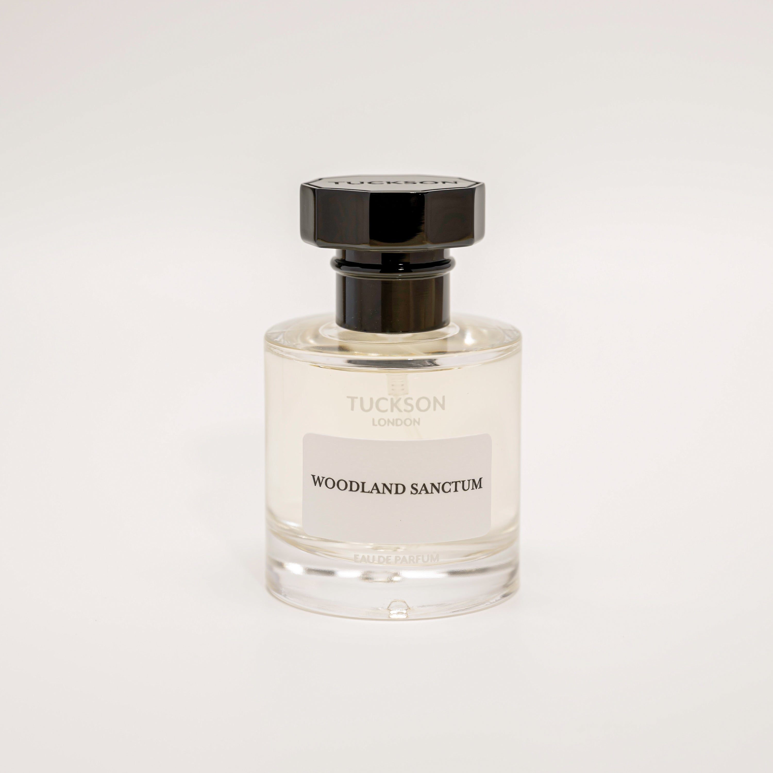 TUCKSON Woodland Sanctum Eau de parfum 50ml atomiser front, with black metal Tuckson overcap 