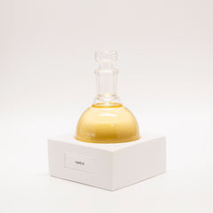 Tuckson Flagship Cafe 75 Eau de Parfum flask on hand made porcelain base 
