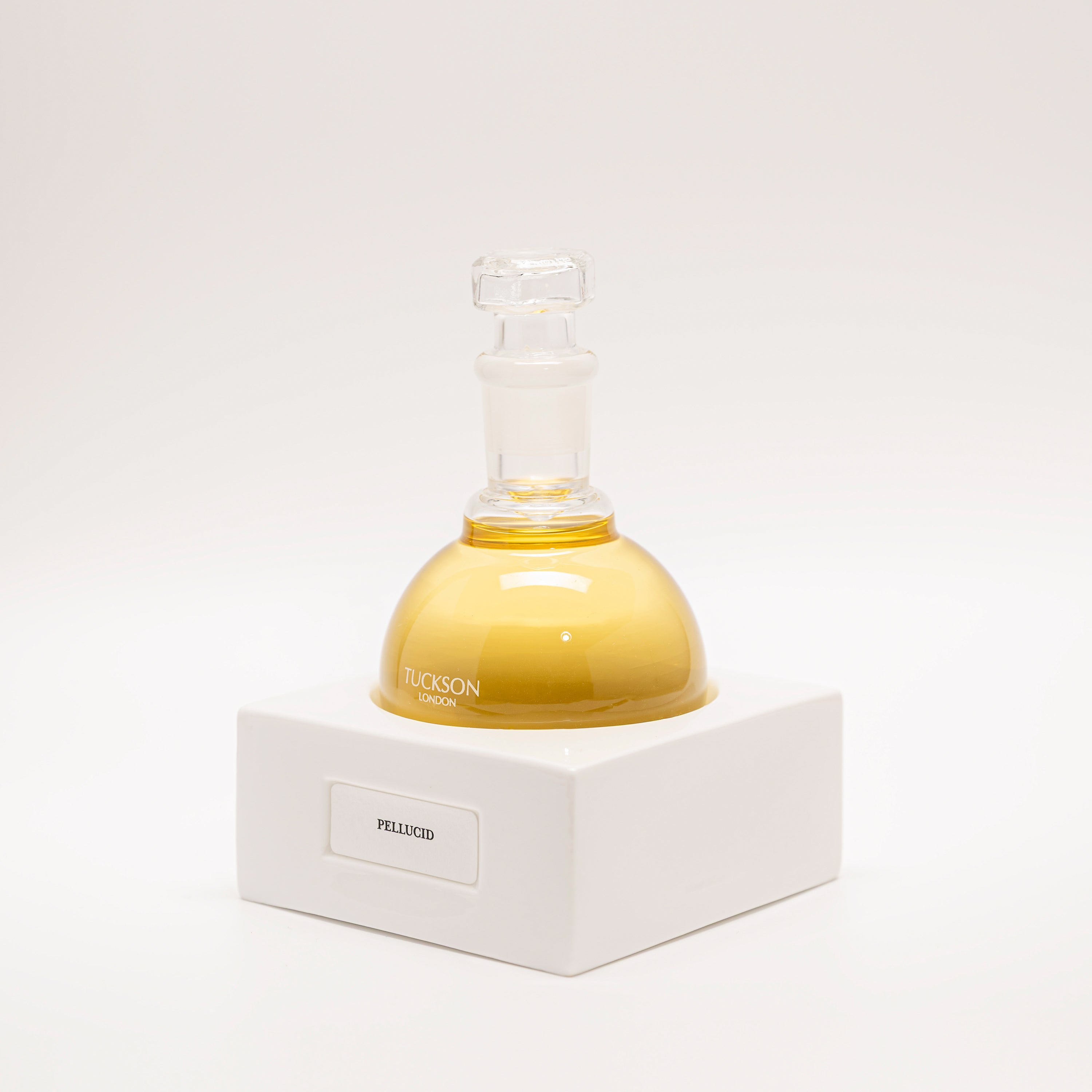 Tuckson Flagship Pellucid Eau de Parfum Solar Flair flask on hand made porcelain base 
