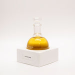 Tuckson Flagship Saint Rhubarb Eau de Parfum Solar Flair flask on hand made porcelain base 
