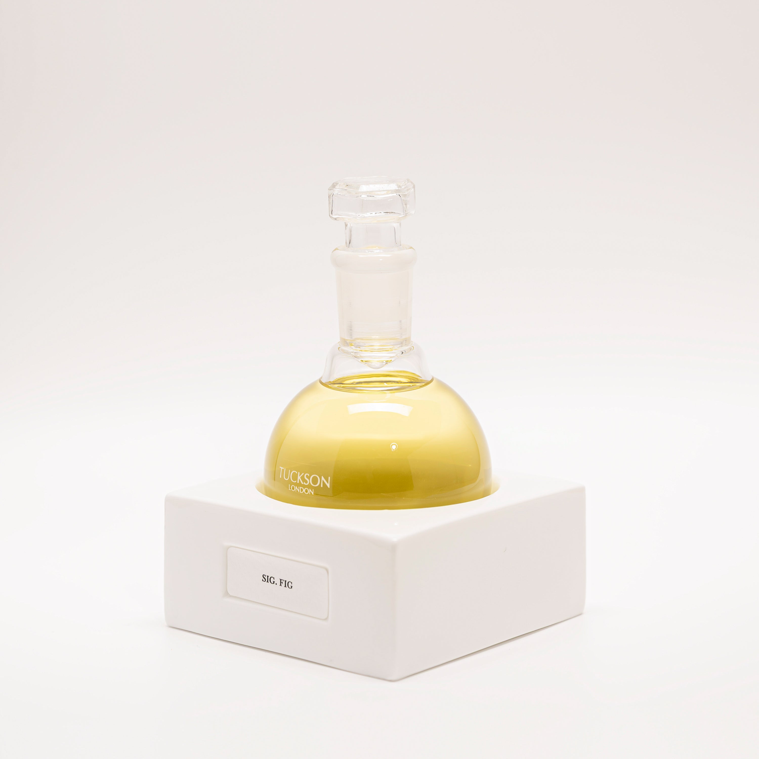 Tuckson Flagship Sig .Fig Eau de Parfum flask on hand made porcelain base 
