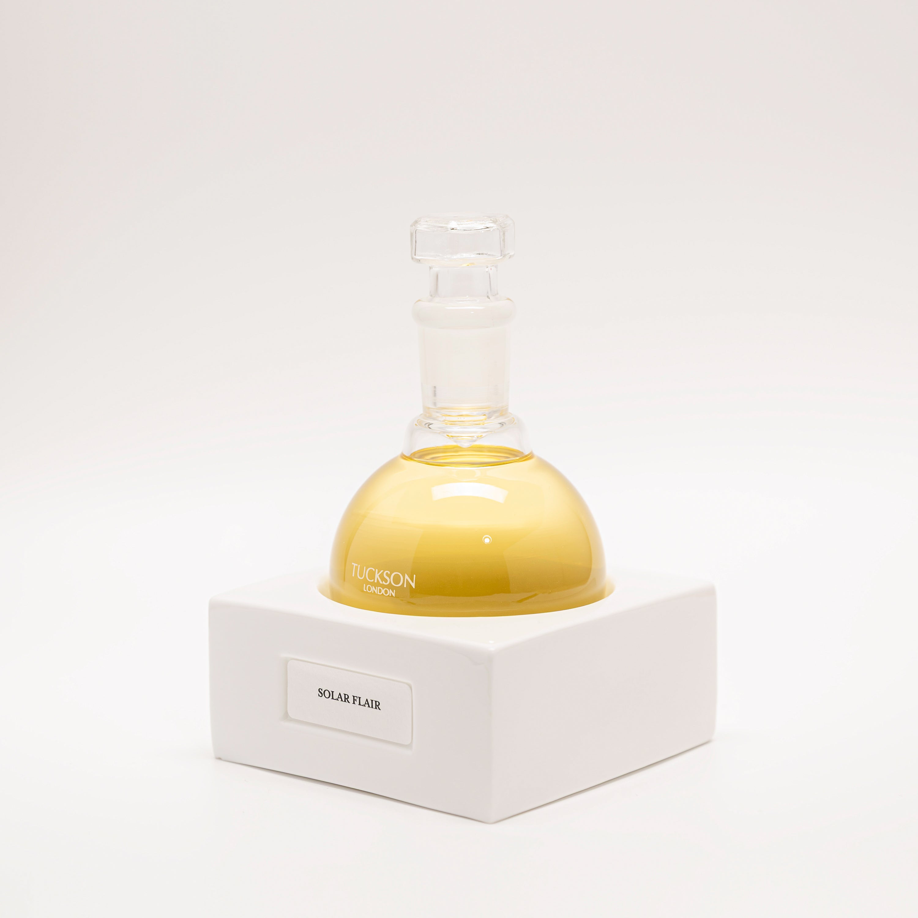 Tuckson Flagship Eau de Parfum Solar Flair flask on hand made porcelain base 
