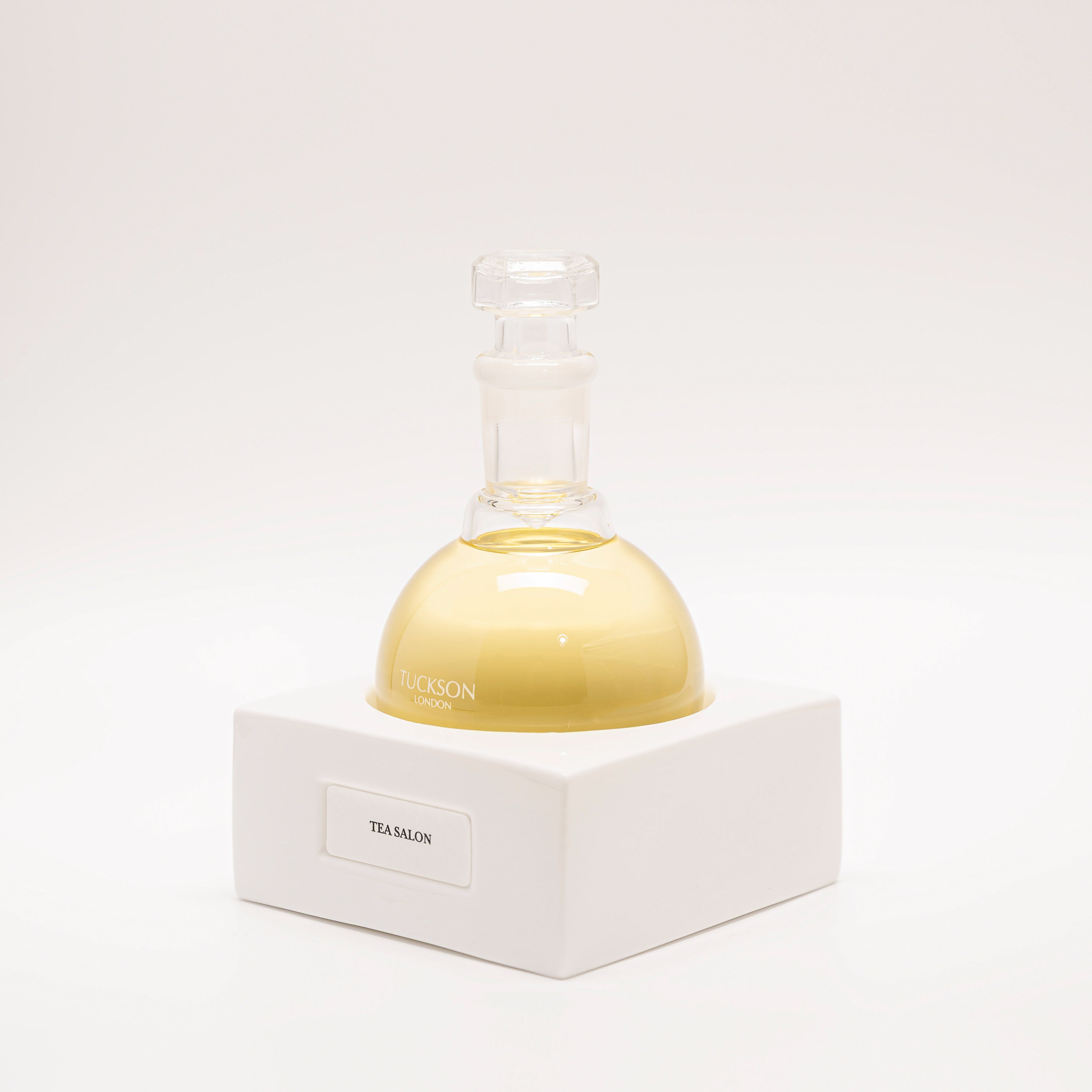 Tuckson Flagship Tea Salon Eau de Parfum flask on hand made porcelain base 
