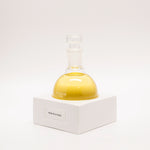 Tuckson Flagship Nom de Guerre Eau de Parfum flask on hand made porcelain base 