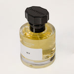 TUCKSON london BLT Eau de Parfum 50 ml Atomiser with black metal overcap from the top angle
