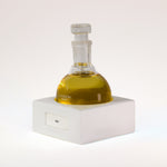 TUCKSON london BLT Eau de Parfum 150 ml  flagship flask resting on a handmade white porcelain square base labelled BLT
