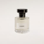 TUCKSON london Glassine Eau de Parfum 50 ml Atomiser with black metal overcap from the front angle 
