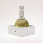 TUCKSON london Psidium Eau de Parfum 150 ml  flagship flask resting on a handmade white porcelain square base labelled Psidium
